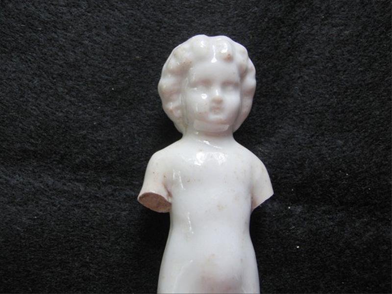 antique frozen charlotte doll